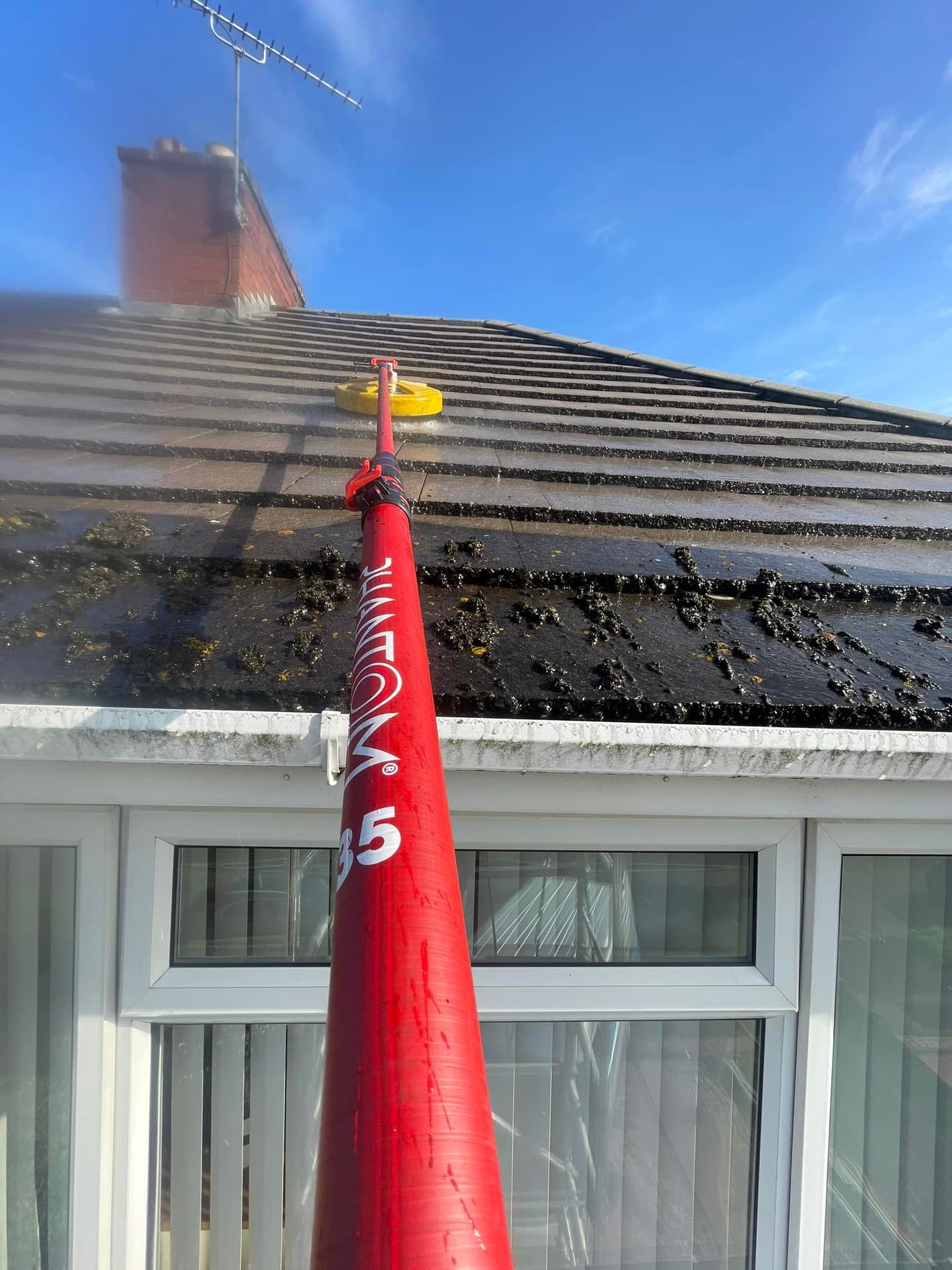 Roof before and after pressure washing