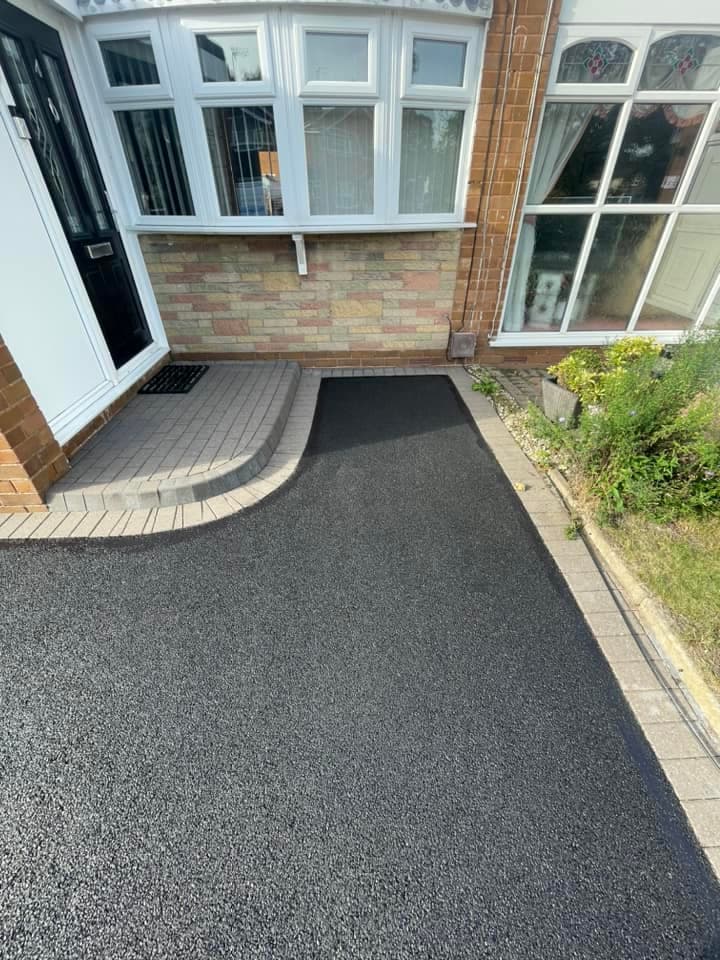 Freshly washed tarmac surface